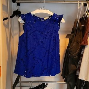 Cute size large shirt with ruffle cap sleeve.